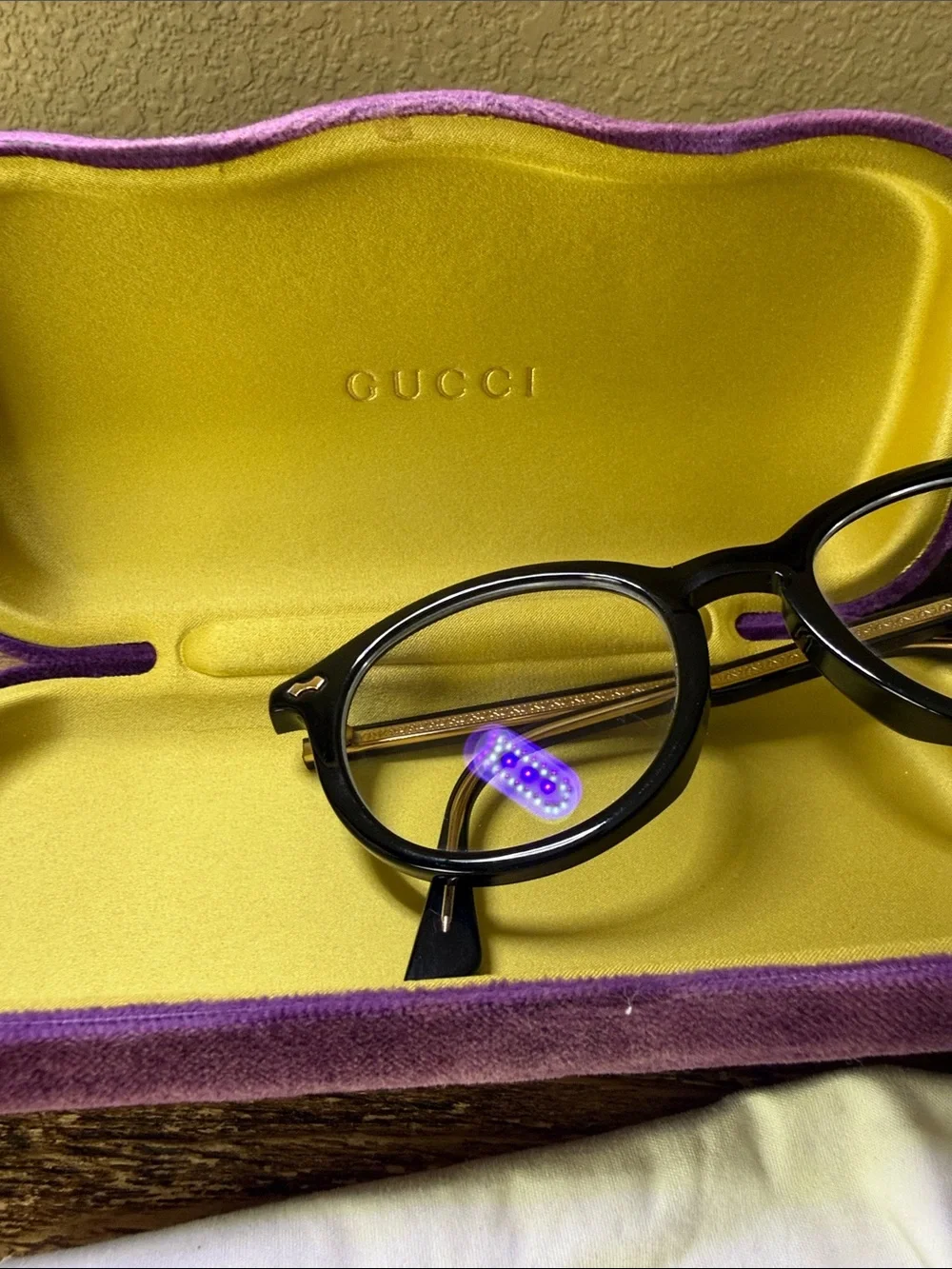 Gucci Black Round Optical Glasses with purple case, dust bag, and cleaning cloth